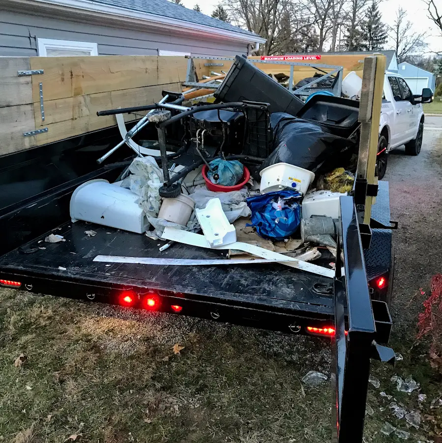 Roll-off dumpster delivered to a residential driveway in Highland Beach