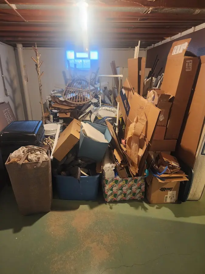 Roll-off dumpster container at job site for 4 Yard Dumpster Rental in Highland Beach